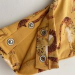 سرهمی بدون آستین برند next طرح شیر جنگل - Image 3