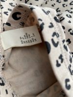 شلوار (لگ) دخترانه طرح پلنگی نسکافه ای برند H&M - Image 3