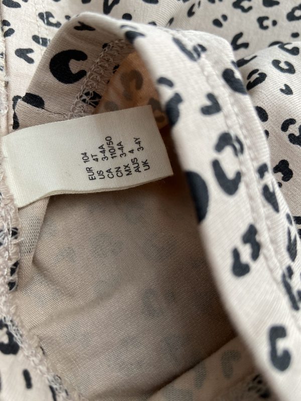 شلوار (لگ) دخترانه طرح پلنگی نسکافه ای برند H&M - Image 3