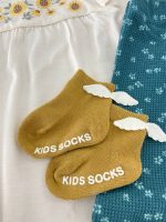 بلوز آستین بلند دخترانه سرشانه چیندار طرح گل آفتابگردون برند C&A - Image 7