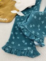 بلوز آستین بلند دخترانه سرشانه چیندار طرح گل آفتابگردون برند C&A - Image 5