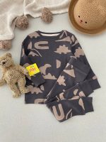 ست بلوز و شلوار طرح دایناسور اسپرت برند NEXT - Image 9