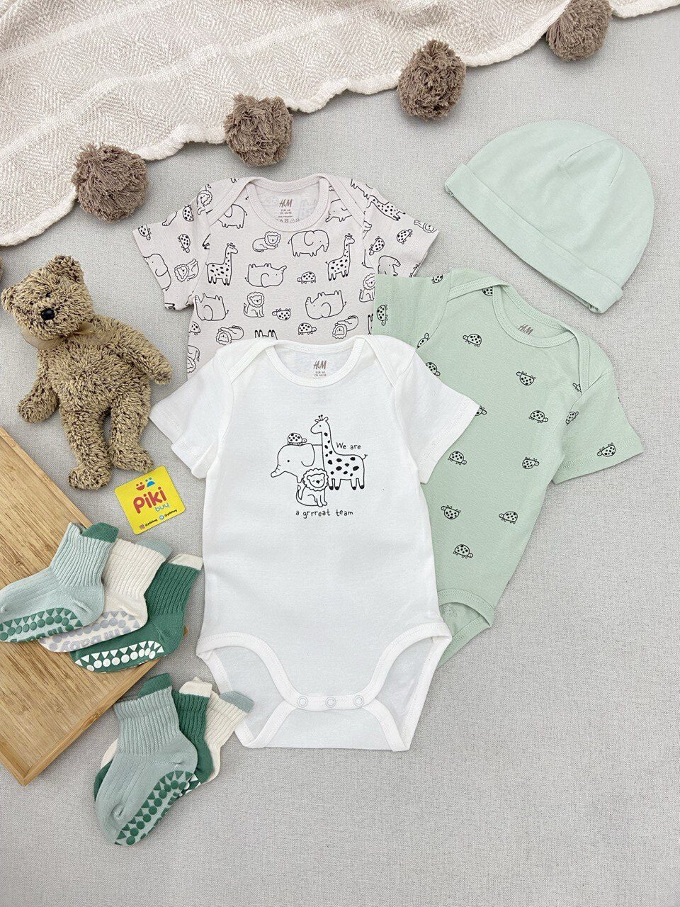 photo_1_2025-12-14_09-31-24 بادی آستین کوتاه اورجینال H&M تم فیل و زرافه (نوزادی تااا 9 ماه) - Image 1