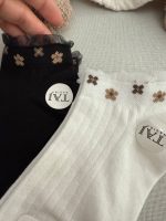 ست جوراب مادر و کودک کبریتی گل گلی - Image 3