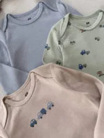بادی نوزادی H&M آستین بلند نخ پنبه با طرح ماشین و رنگ‌های آبی، سبز و کرم