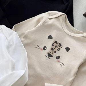 بادی نوزادی آستین بلند H&M با طرح صورت حیوان (هاپو) و رنگ کرم