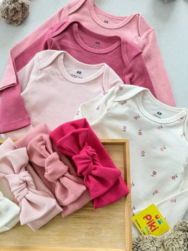 ست بادی نوزادی دخترانه H&M صورتی و گل‌دار همراه با هدبند