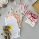 بادی بندی دخترانه نخی برند H&M در رنگ‌های پاستلی متنوع مناسب سیسمونی
