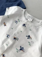 رامپر نوزادی سفید H&M با طرح هواپیما