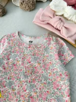 لیبل برند H&M و سایز رامپر نوزادی گل‌دار به همراه هدبند ست