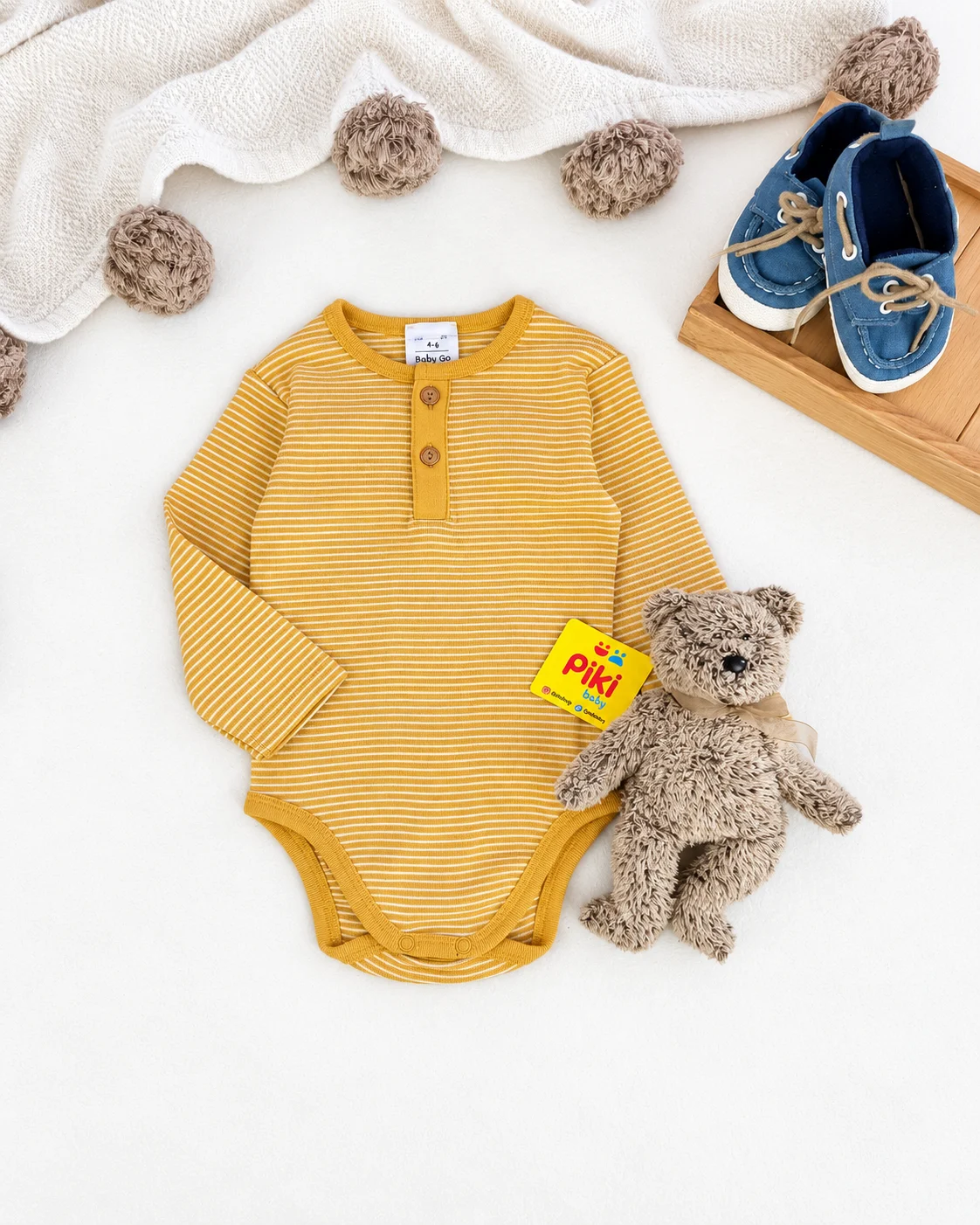 بادی آستین بلند راهراه خردلی Baby Go نمای کامل بادی نوزادی آستین بلند راهراه خردلی و سفید Baby Go با دکمه فشاری فاق