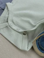 دکمه‌های فشاری ایمن قسمت فاق بادی نوزادی H&M برای تعویض آسان پوشک